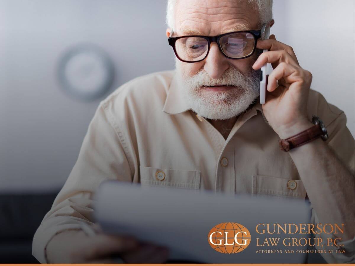 An old man reviewing his estate plan after the death of a loved one