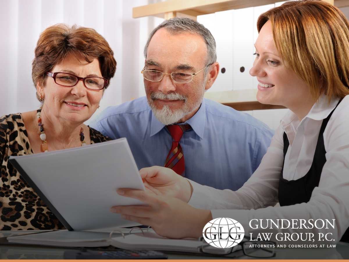 Two adults consulting a estate planning attorney about their retirement accounts in Mesa, AZ