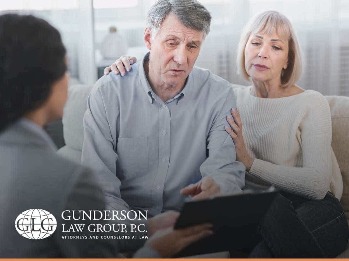 A married couple consulting their attorney about estate planning in Arizona.