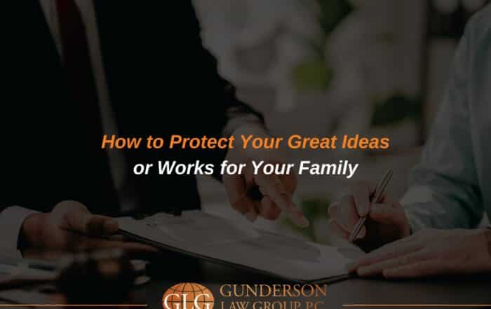 Arizona estate planning attorney reviewing intellectual property documents with a client