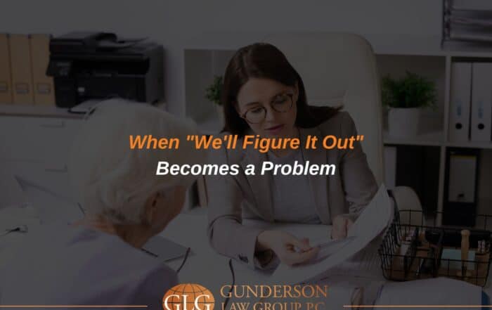 state planning attorney reviewing power of attorney documents with an elderly parent